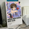 Poster for Ouran High School Host Club featuring anime characters in purple suits and pink accents
