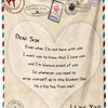 A beige knit blanket featuring a heart design and text saying Dear Son I love you and I'm always proud of you