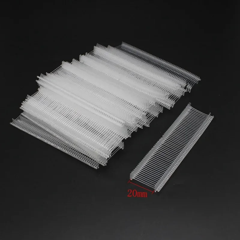 A close-up view of precision plastic tagging barbs arranged in parallel rows, with a scale indicating 20mm.