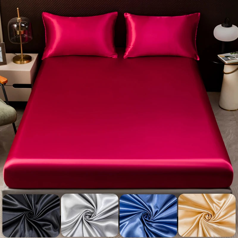 Solid satin bedding set featuring a vibrant magenta color with fitted sheets.