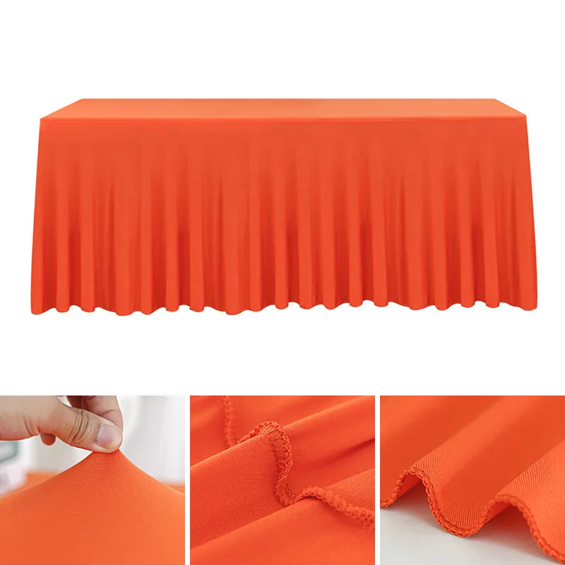 Orange stretchable waterproof rectangle tablecloth draped on a table.
