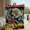 A dark poster featuring a fierce skeleton devil with flames, titled The Number of the Beast.