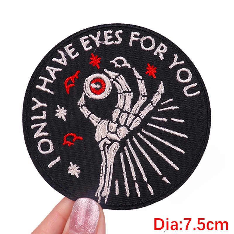 Black embroidered patch featuring a skull design with rays of light and the text Only Have Eyes For You