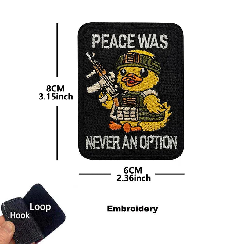 Black embroidery patch featuring a yellow duck with text that reads Peace was never an option