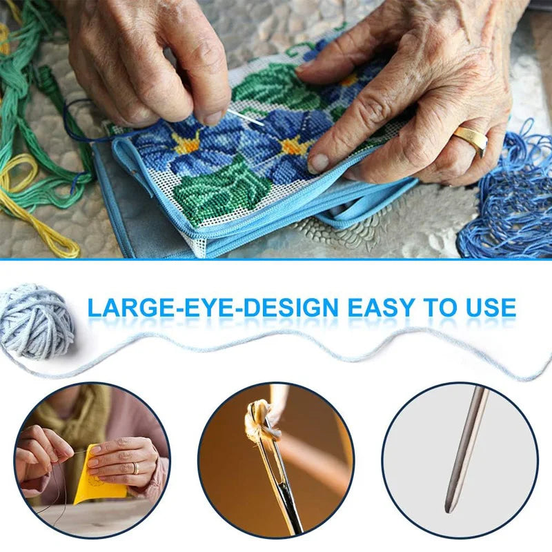 Hands are using a large-eye design crochet hook to work on green yarn.