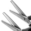 A pair of professional stainless steel pinking shears shown in a close-up view.
