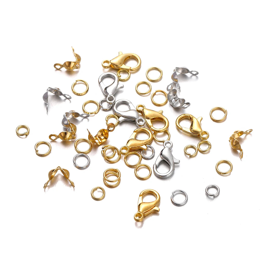 A collection of gold and silver lobster clasp findings for jewelry making.