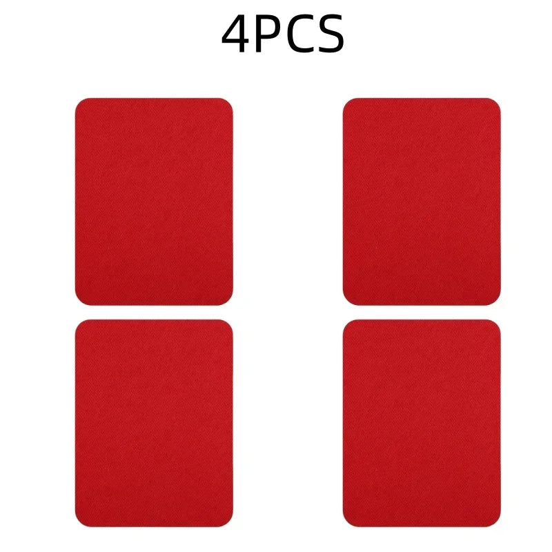 Four red iron-on fabric repair patches laid out for sale.