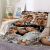 A 3D printed fleece throw blanket featuring multiple portraits of Stray Kids members.