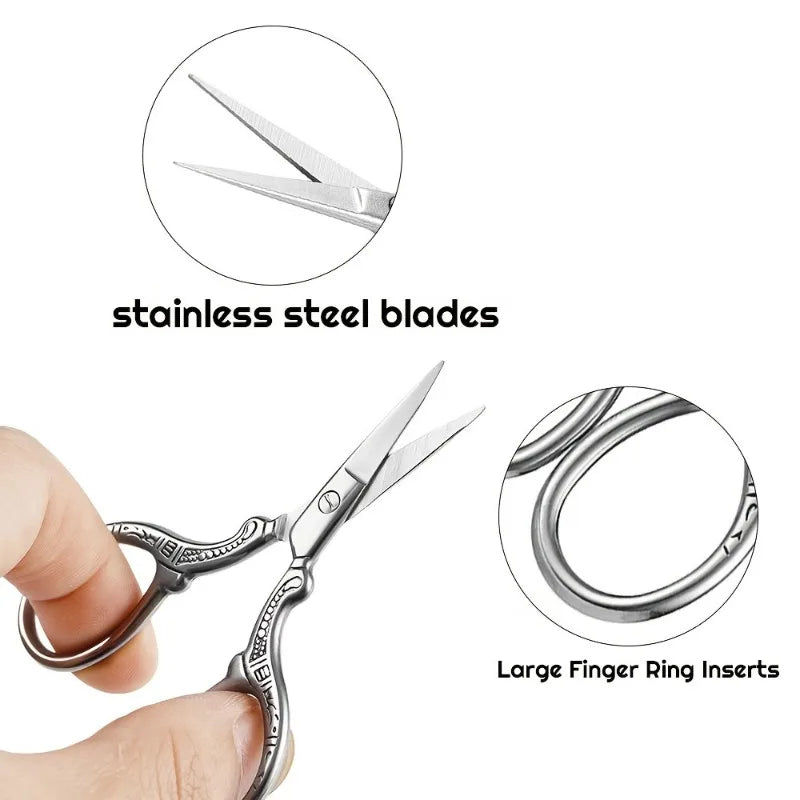Stainless steel embroidery scissors and large finger ring inserts shown with a hand