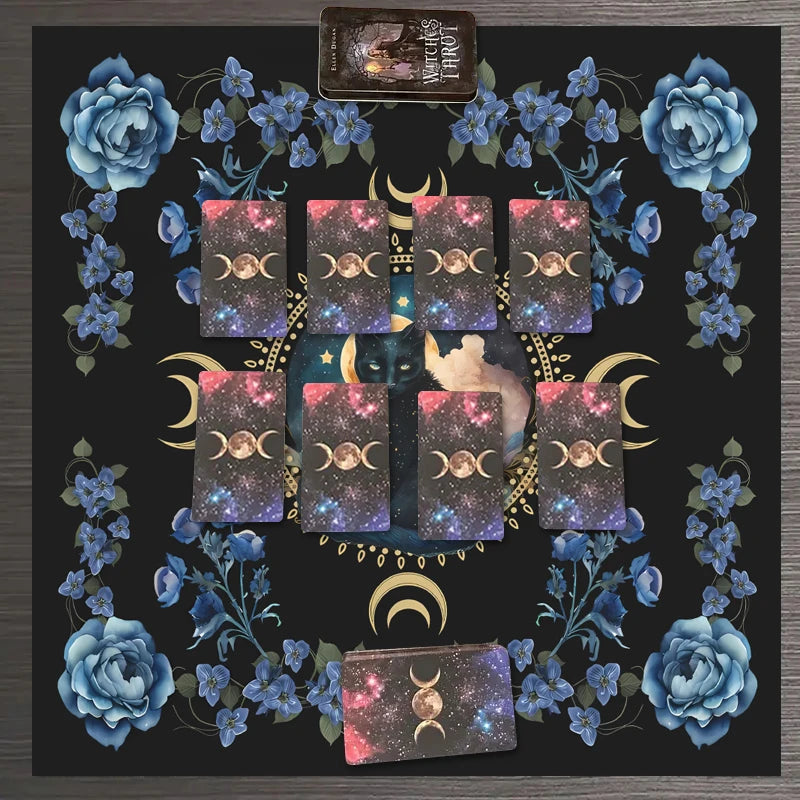 A mat featuring a floral design with tarot cards centered around a crescent moon and celestial elements.