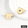 Five gold-toned metal seamless magnetic closure buckles displayed on a white background.