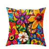 A vibrant floral patterned decorative pillow cover featuring bright colors like purple, yellow, and orange.
