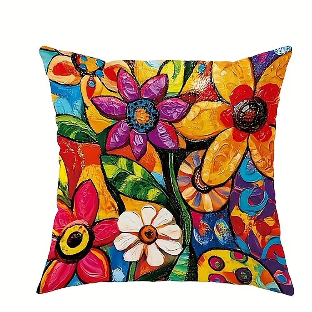 A vibrant floral patterned decorative pillow cover featuring bright colors like purple, yellow, and orange.