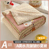 A lightweight summer quilt featuring a cartoon pattern, shown rolled up on a white surface.