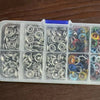 A clear plastic storage case holds various metal buckle clamps and rings in multiple compartments.