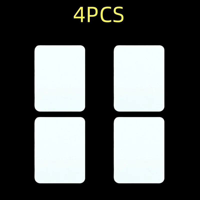 A set of four white iron-on fabric repair patches displayed against a black background.