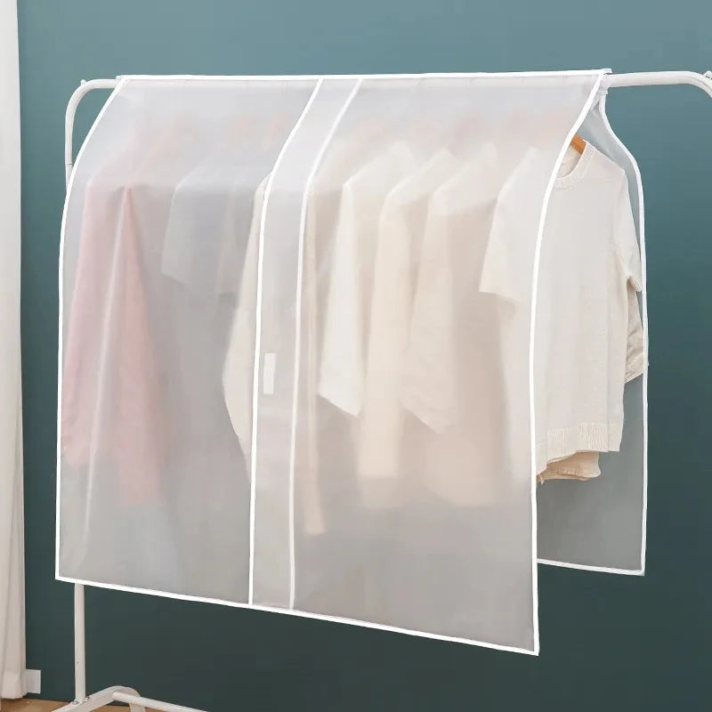 A transparent garment dust cover is shown hanging on a white rack, protecting clothes.