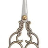 Vintage stainless steel sewing scissors with decorative handles
