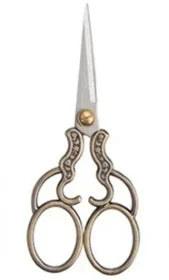 Vintage stainless steel sewing scissors with decorative handles