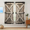 A pair of rustic gray wood plantation shutters with a rod pocket hanging on a white wall.