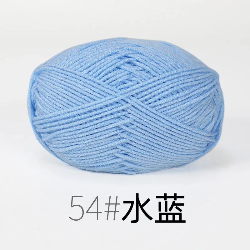 A ball of light blue organic cotton 4ply knitting yarn labeled 54# 水蓝.