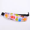 Pink fabric head support for a baby car seat featuring colorful animal faces