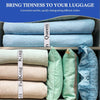 A box of elastic bed sheet organizers with size labels, including Queen and Full King sizes.