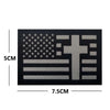 Black embroidered patch featuring a flag design with stars and a cross symbol.