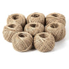 A pile of natural jute twine rolls used for crafts and decor.