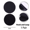 A pair of black hook and loop embroidered horror movie patches for clothing.