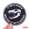 Black embroidered patch featuring a white skull and teeth design with the text It Gets Worse Before It Gets Worse