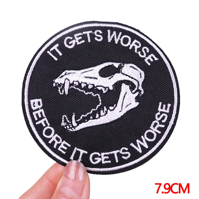 Black embroidered patch featuring a white skull and teeth design with the text It Gets Worse Before It Gets Worse