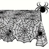 Black spider web lace table runner for Halloween featuring intricate spider webs and a black spider