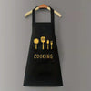 Black waterproof oil-proof PVC kitchen apron with a gold silhouette of cooking utensils
