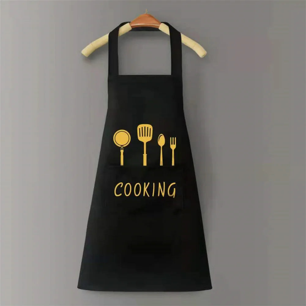Black waterproof oil-proof PVC kitchen apron with a gold silhouette of cooking utensils