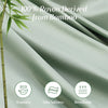 Close-up of a smooth, light green rayon derived from bamboo fabric draped in soft folds.