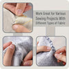 Close-up of hands using stainless steel hand sewing needles to sew various fabrics.