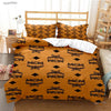 Orange duvet cover set featuring a repeating MCM logo pattern on a white duvet and pillow.