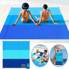 A foldable waterproof outdoor picnic mat shown in various blue and teal color combinations.