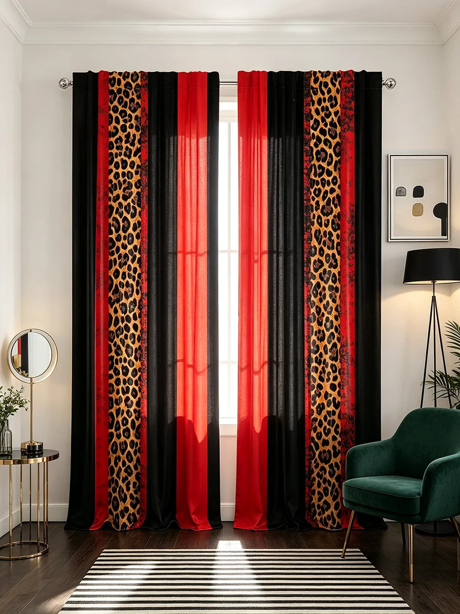 A set of two floor-length curtains featuring a black and orange leopard print fabric, displayed in a bright room.