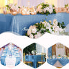 Blue sequin rectangle table cover with gold accents and floral decorations for a party setting