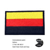A rectangular embroidered patch with horizontal stripes of yellow, red, and dark blue.