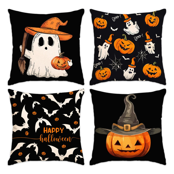 A set of four black pillow covers featuring Halloween designs including ghosts, pumpkins, and bats.