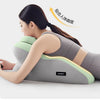 A woman is using an ergonomic pillow designed for stomach sleepers, demonstrating its body support.