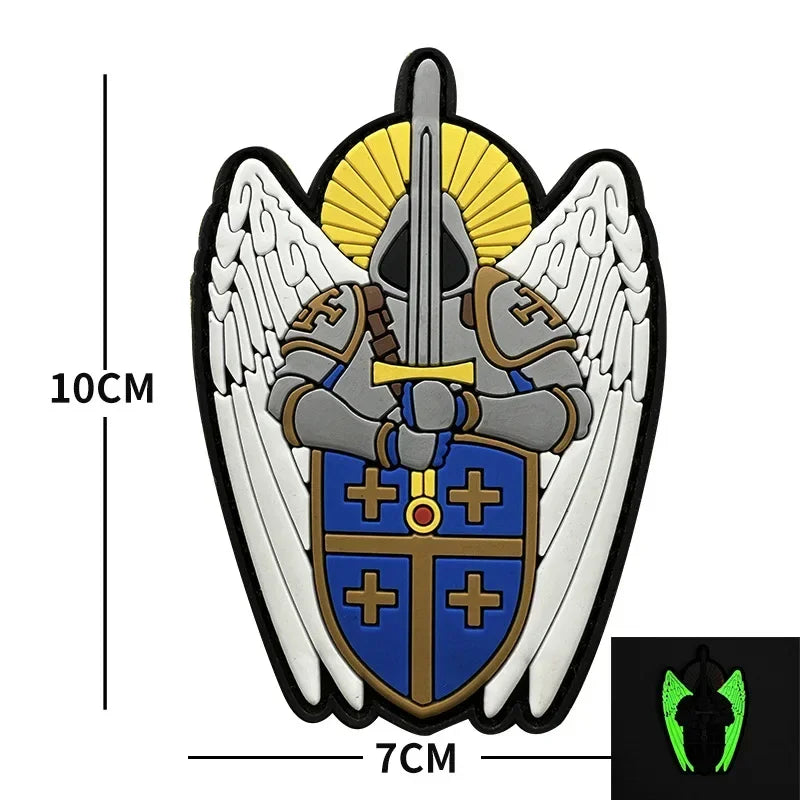 Embroidered angel patch featuring wings, a sunburst, and a shield design on tactical gear.