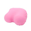 A pink memory foam contour chest pillow shown from the side.