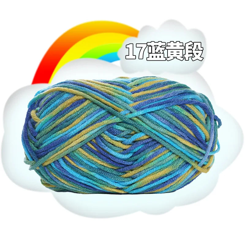 A ball of 17-ply premium milk cotton yarn with a rainbow background.