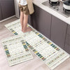 Two rectangular non-slip waterproof kitchen rugs with a diamond print laid out on a light wood floor.