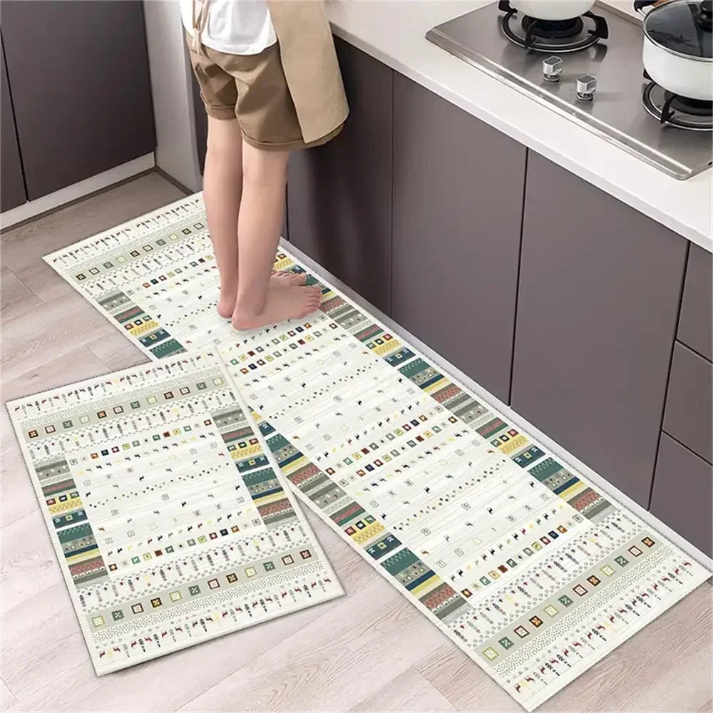 Two rectangular non-slip waterproof kitchen rugs with a diamond print laid out on a light wood floor.